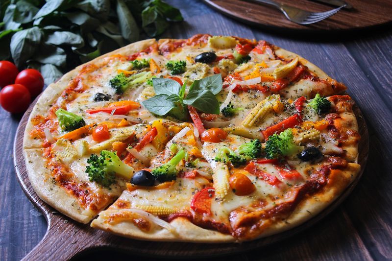 BBQ Chicken pizza with smoky sauce and red onions