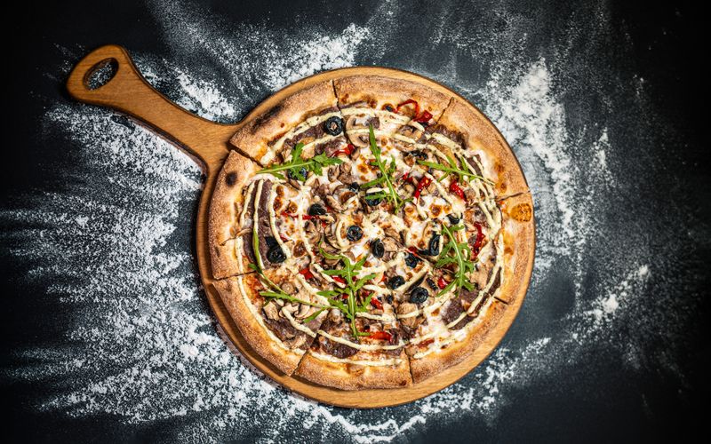 Spicy Italian sausage and pepper pizza